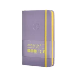 CUADERNO CON GOMILLA ANTARTIK NOTES TAPA DURA A6 HOJAS LISAS MORADO Y AMARILLO 100 HOJAS 80 GR FSC