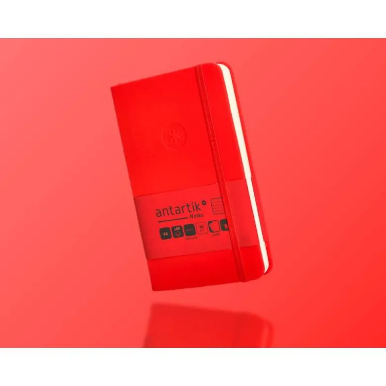 CUADERNO CON GOMILLA ANTARTIK NOTES TAPA DURA A6 HOJAS CUADRICULA ROJO 100 HOJAS 80 GR FSC