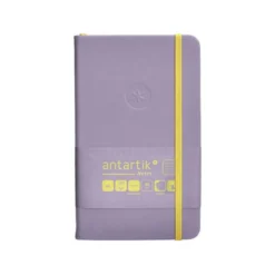 CUADERNO CON GOMILLA ANTARTIK NOTES TAPA DURA A6 HOJAS CUADRICULA MORADO Y AMARILLO 100 HOJAS 80 GR FSC