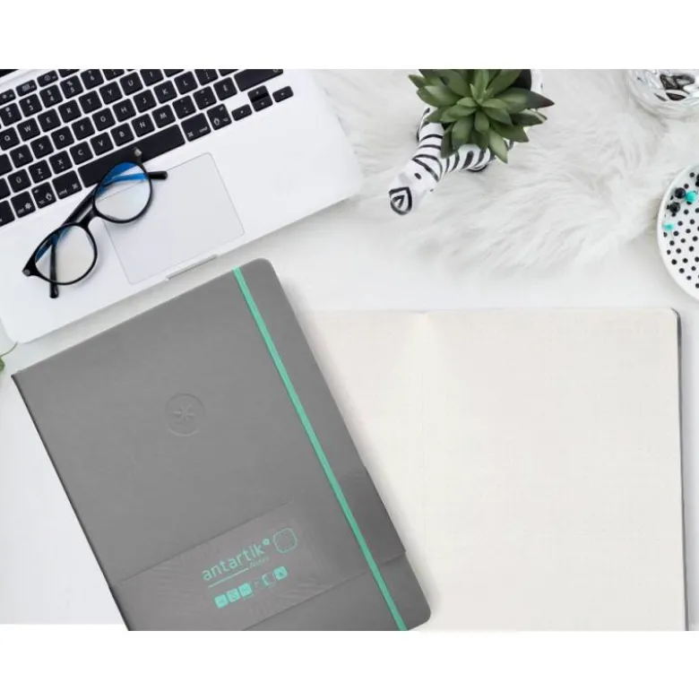 CUADERNO CON GOMILLA ANTARTIK NOTES TAPA DURA A4 HOJAS PUNTOS GRIS Y TURQUESA 100 HOJAS 80 GR FSC