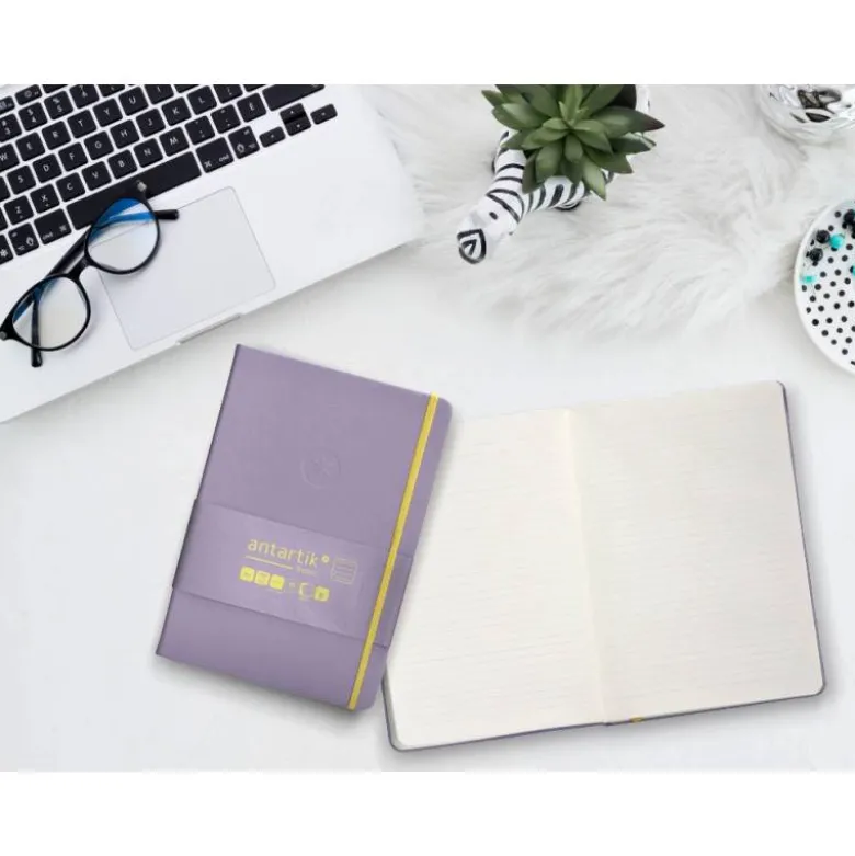 CUADERNO CON GOMILLA ANTARTIK NOTES TAPA DURA A5 HOJAS RAYAS MORADO Y AMARILLO 100 HOJAS 80 GR FSC