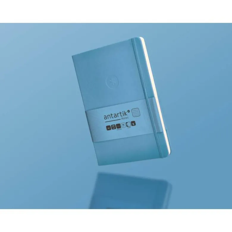 CUADERNO CON GOMILLA ANTARTIK NOTES TAPA DURA A5 HOJAS CUADRICULA AZUL CLARO 100 HOJAS 80 GR FSC