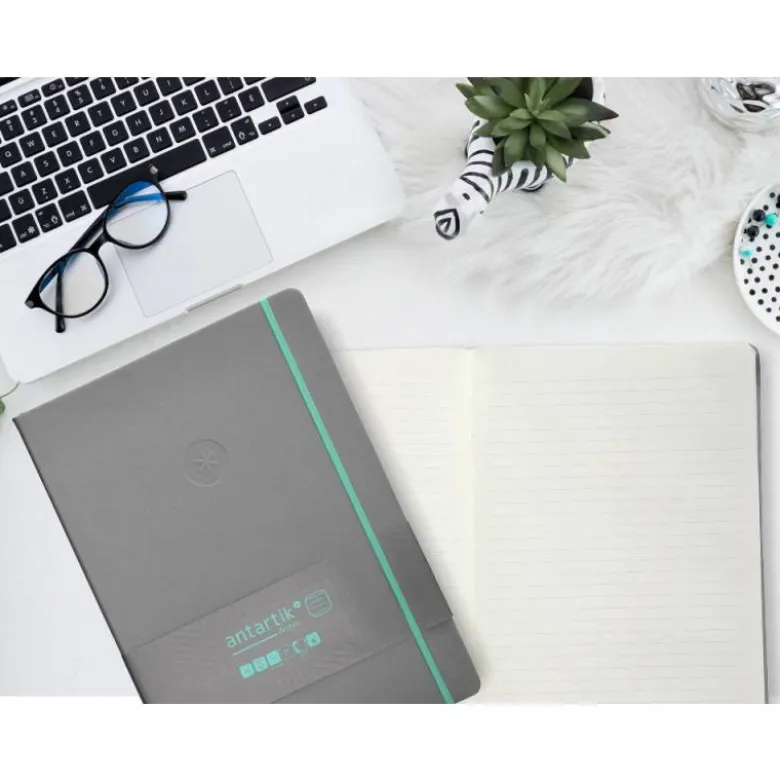 CUADERNO CON GOMILLA ANTARTIK NOTES TAPA DURA A4 HOJAS RAYAS GRIS Y TURQUESA 100 HOJAS 80 GR FSC