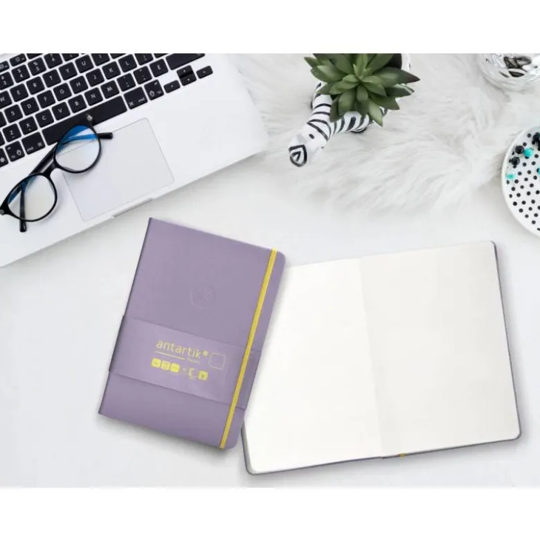 CUADERNO CON GOMILLA ANTARTIK NOTES TAPA DURA A5 HOJAS LISAS MORADO Y AMARILLO 100 HOJAS 80 GR FSC