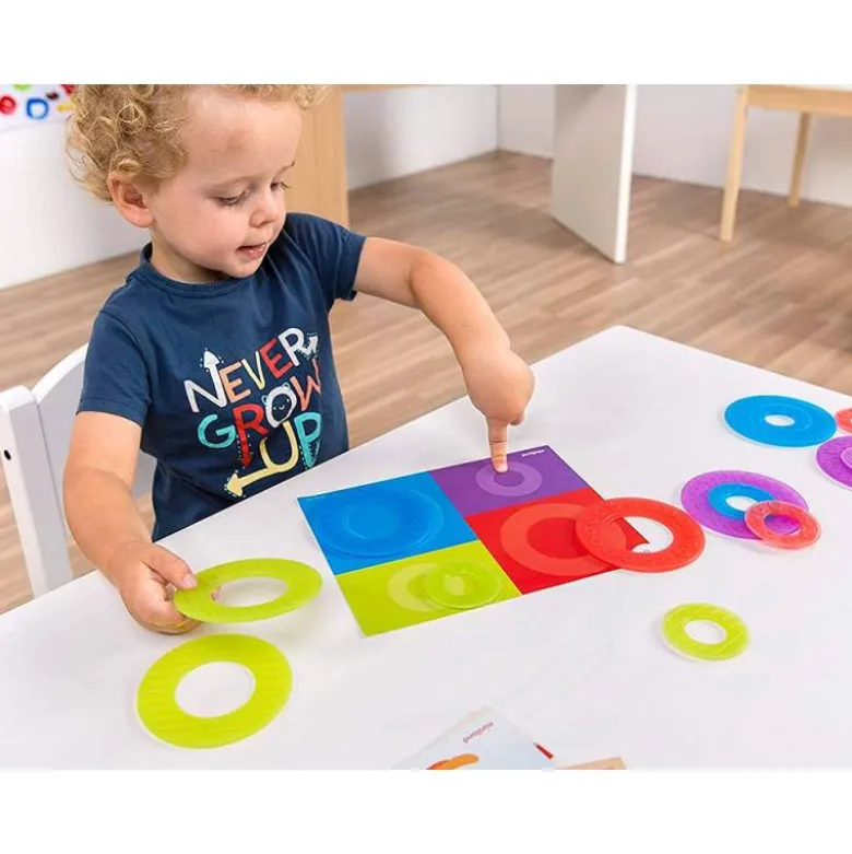 JUEGO MINILAND SET DE 16 AROS TRANSLUCIDOS Y 12 TARJETAS DE ACTIVIDADES DE DIFERENTES TEMATICAS 235X195X80 MM